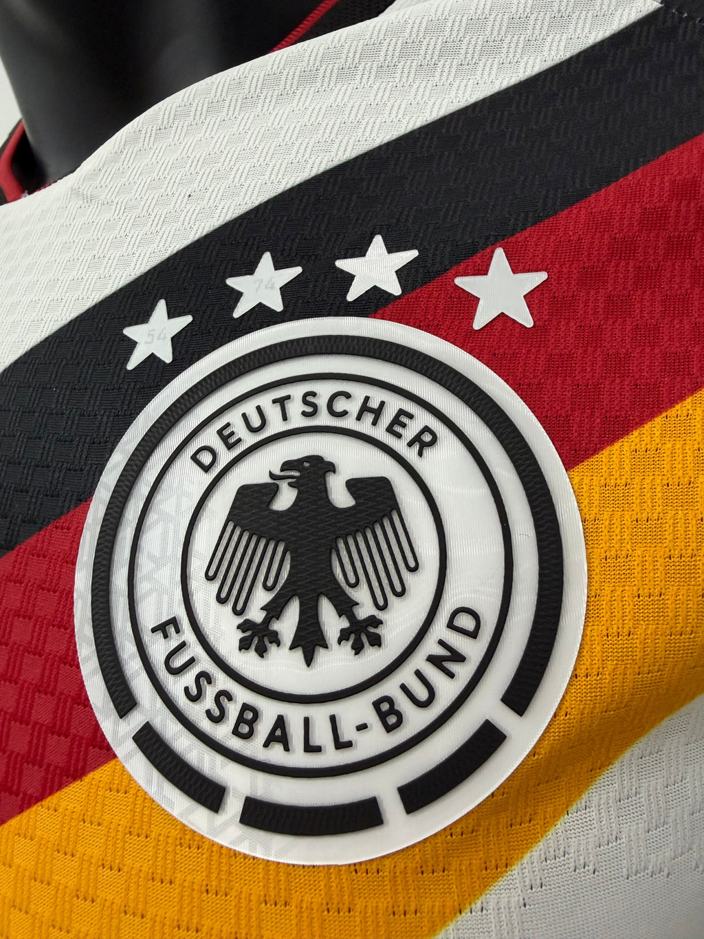 Germany Musiala #10 Home Kit - 2026 World Cup – striped and white and geometric retro football jersey side view