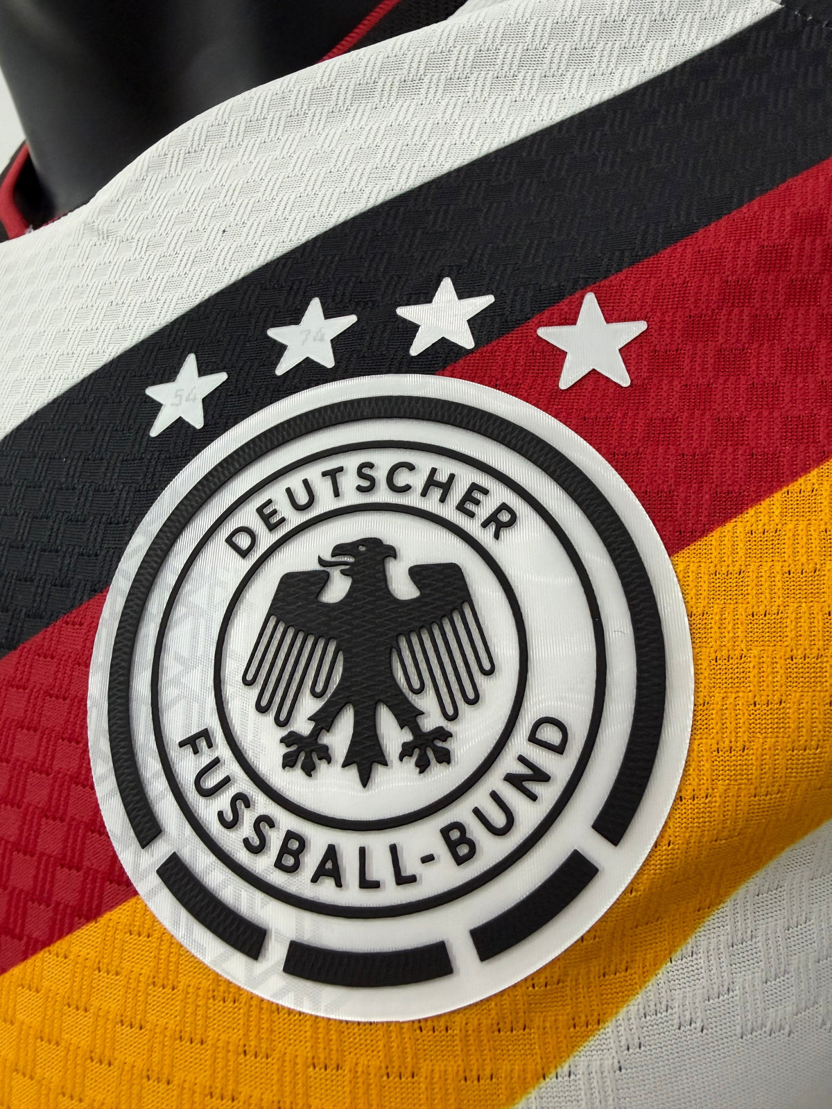 Germany Musiala #10 Home Kit - 2026 World Cup – striped and white and geometric retro football jersey side view