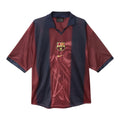 Barcelona x Travis Scott Special Edition Kit – striped retro football jersey front view