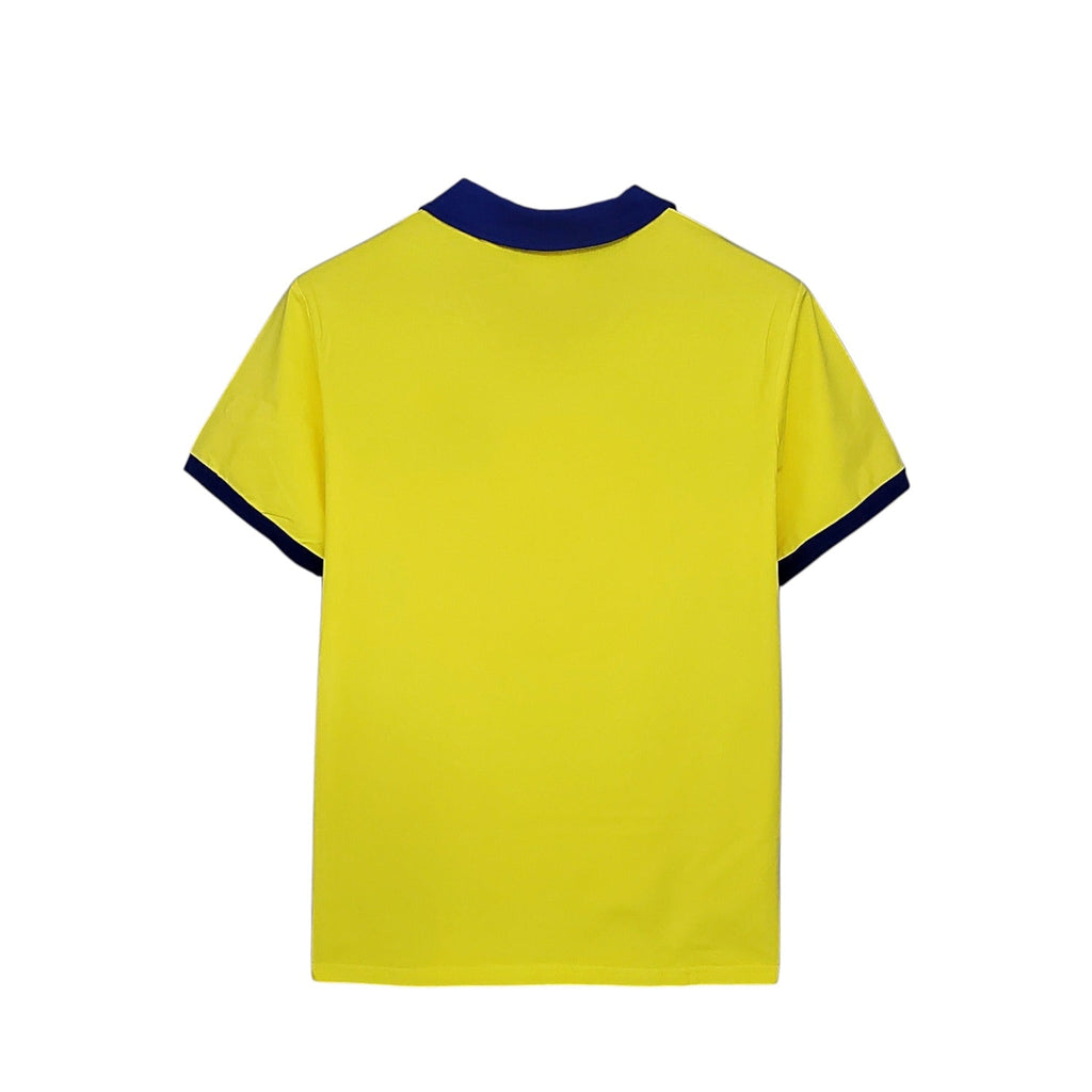 Back view of Archive Football Arsenal 1977/78 retro away jersey in yellow with blue collar and sleeve trim.
