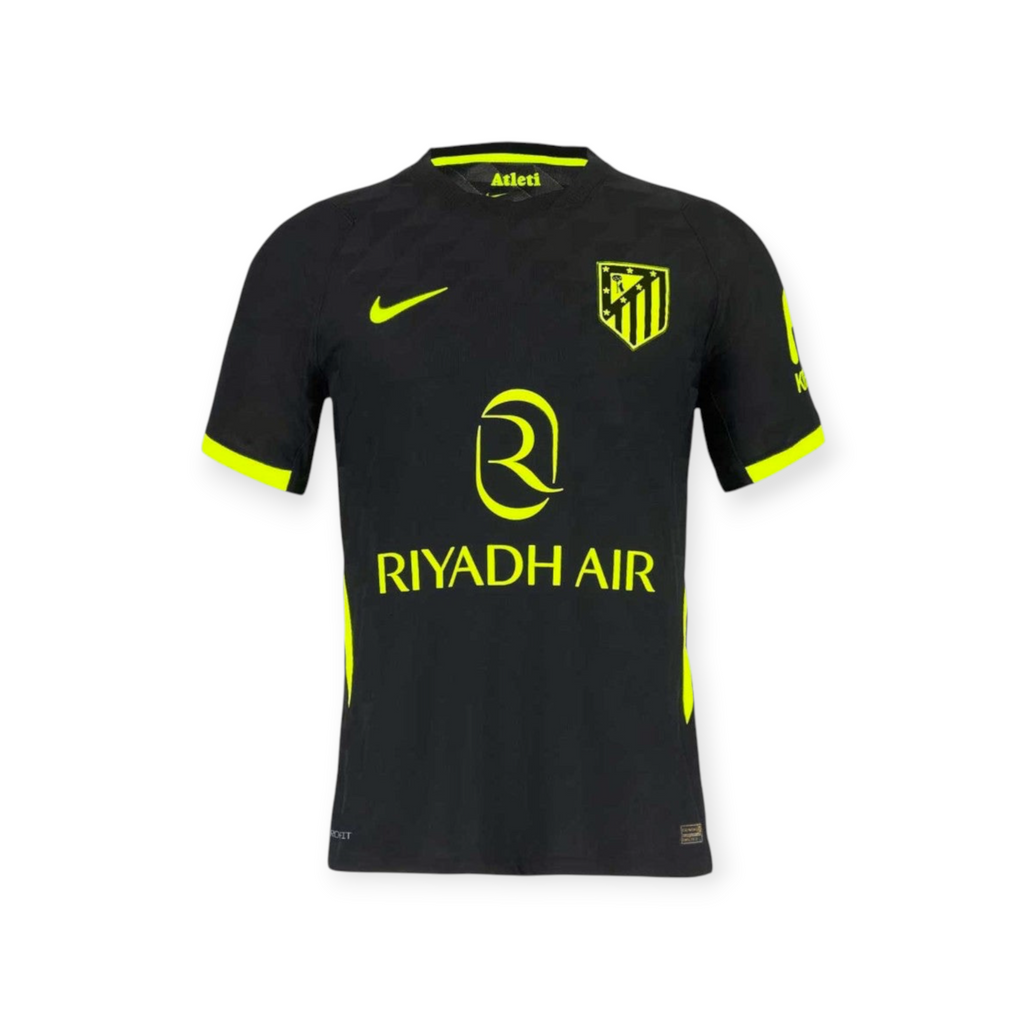 Archive Football Atlético de Madrid 2026/27 away jersey in black with neon yellow accents and team emblem