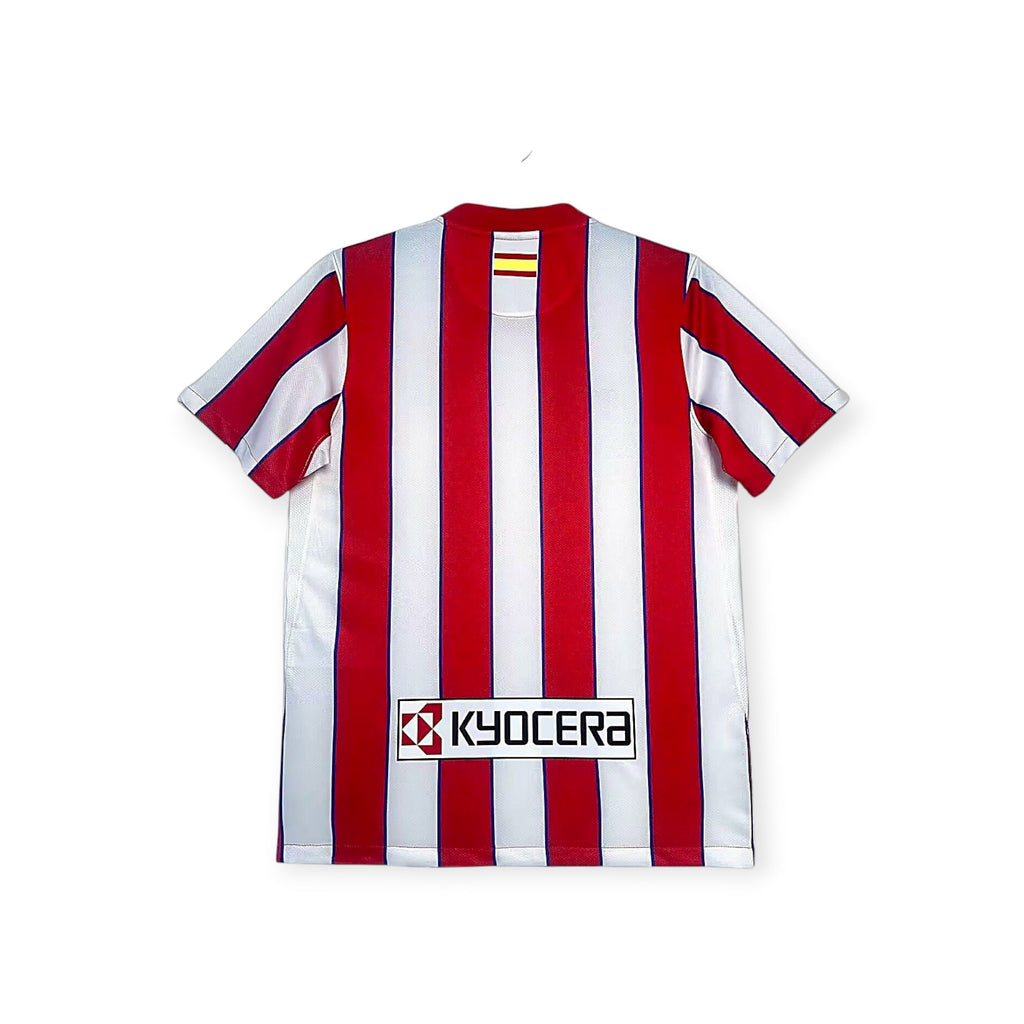 Archive Football Atletico Madrid 2011/12 retro home jersey featuring red and white stripes and Kyocera sponsor logo