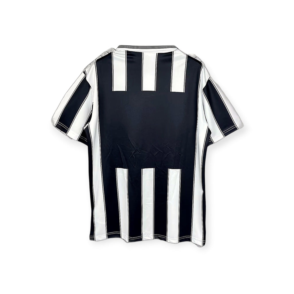 Archive Football Besiktas 1996/97 retro away jersey in black and white vertical stripes, back view.