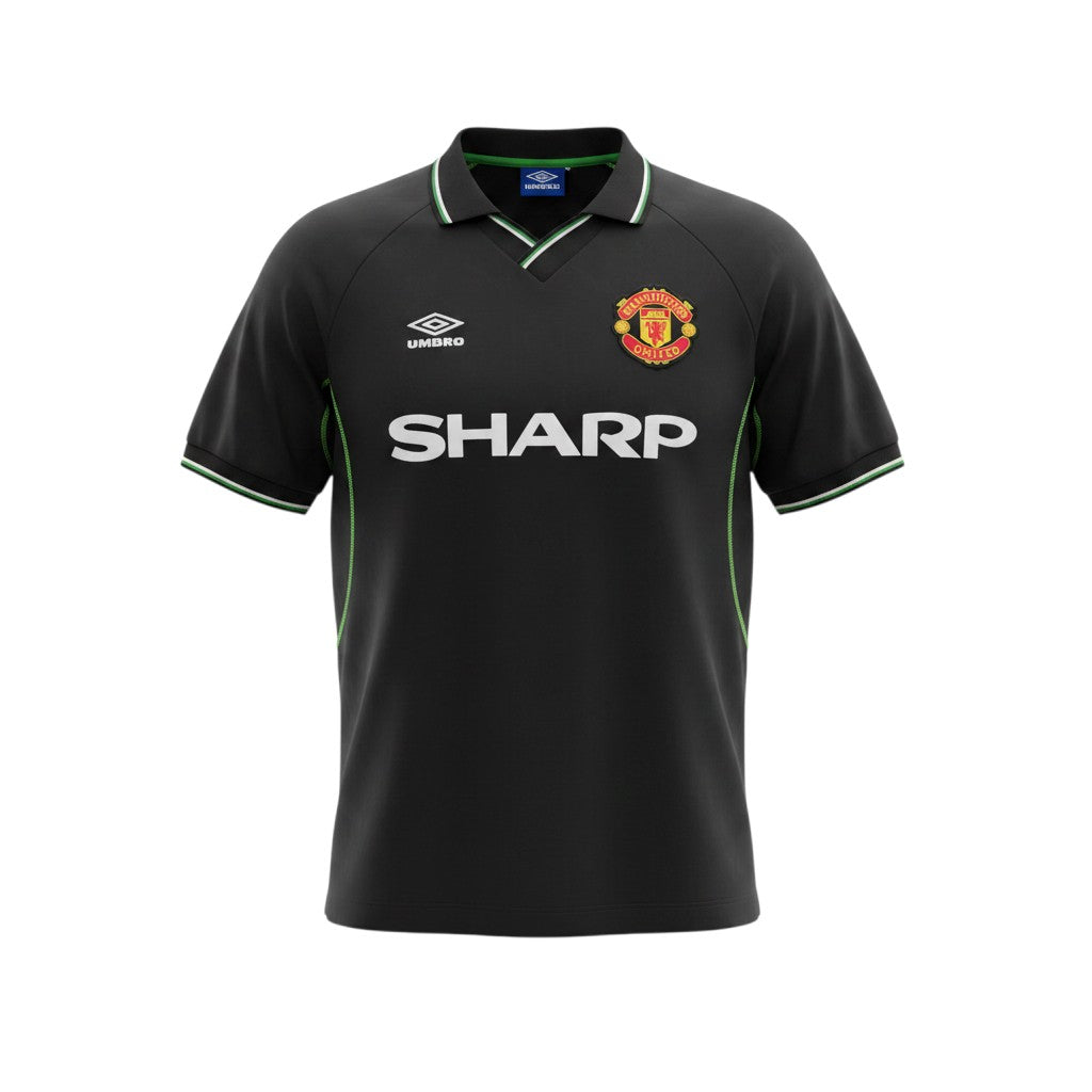 Camiseta retro Archive Football del Manchester United 1998/99, tercera equipación negra con detalles en verde y blanco.