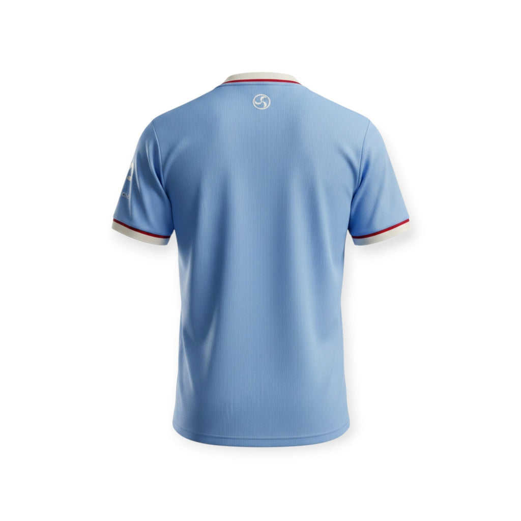 Archive Football Celta Vigo 2026/2027 home jersey in light blue with red and white trim, back view.
