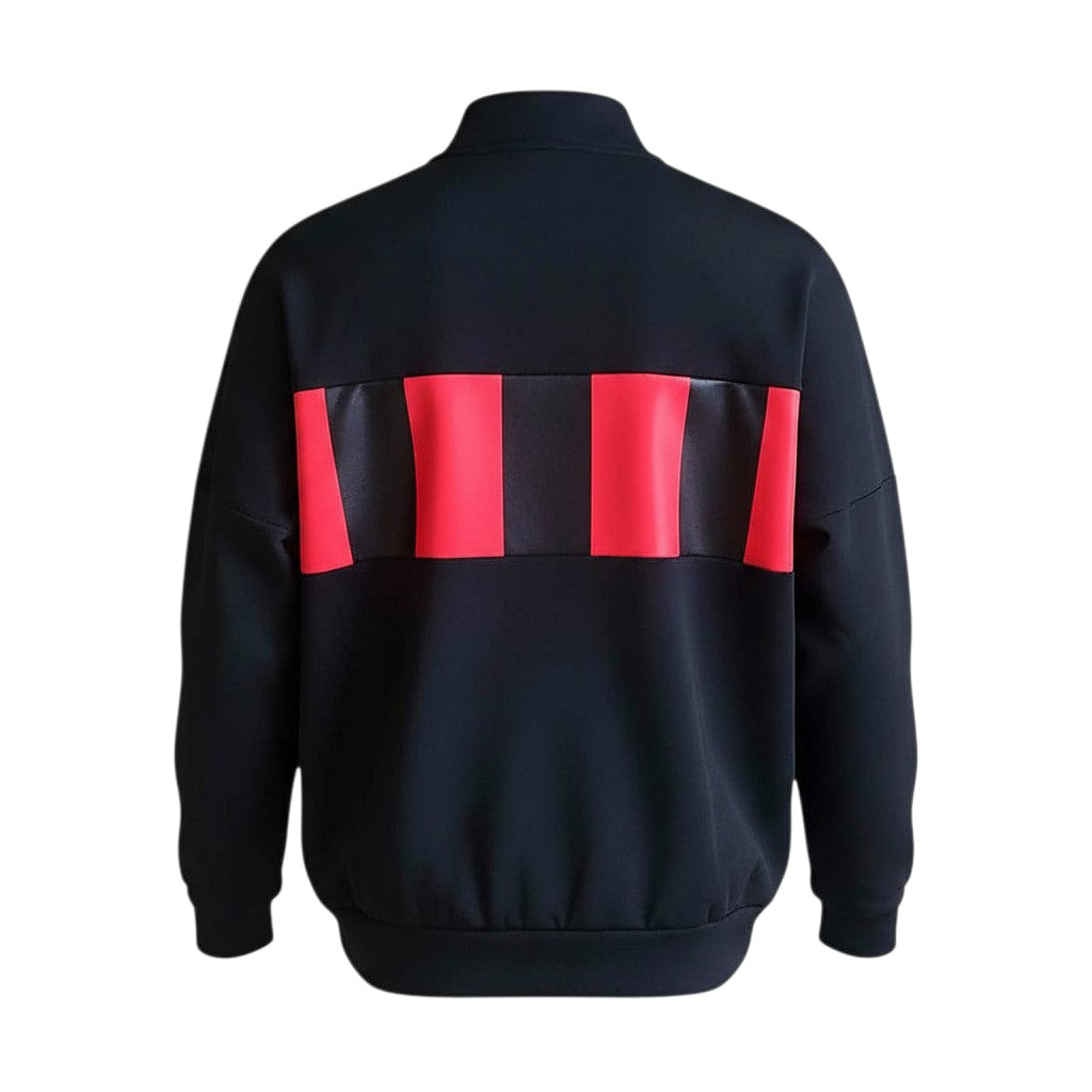 Chaqueta retro Archive Football del Atletico Madrid 1996 en color negro con detalles en rojo, vista trasera.