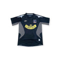 Archive Football Colo-Colo 2006 away retro jersey in black with white accents, embroidered crest, and sponsor logo.