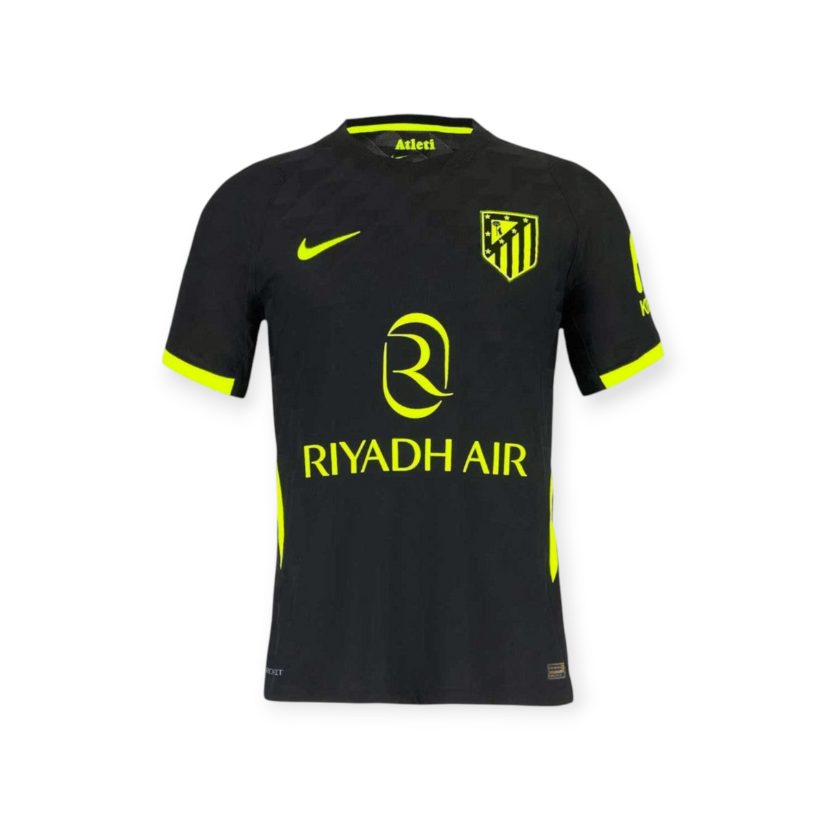 Archive Football Griezmann Atletico de Madrid 2026/27 away jersey in black with neon yellow accents and team crest.
