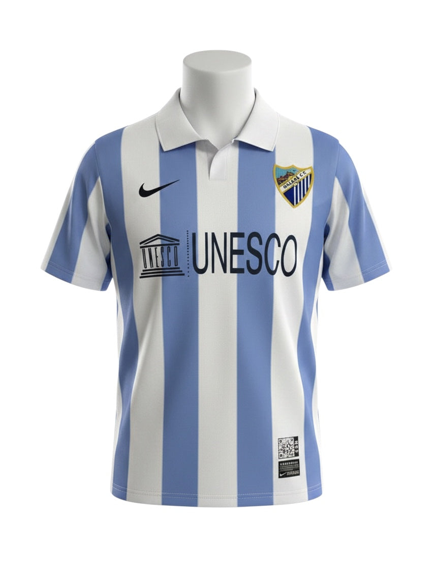 Archive Football Malaga 2013 away retro jersey with blue and white stripes, polo collar, and embroidered club crest.
