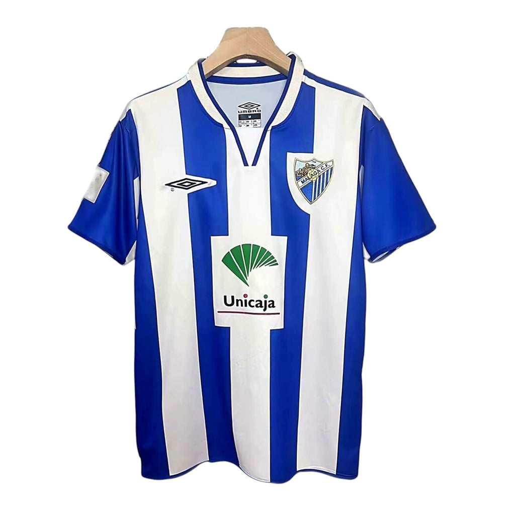 Archive Football Malaga 2005/06 home retro jersey in blue and white stripes with embroidered crest and sponsor logo