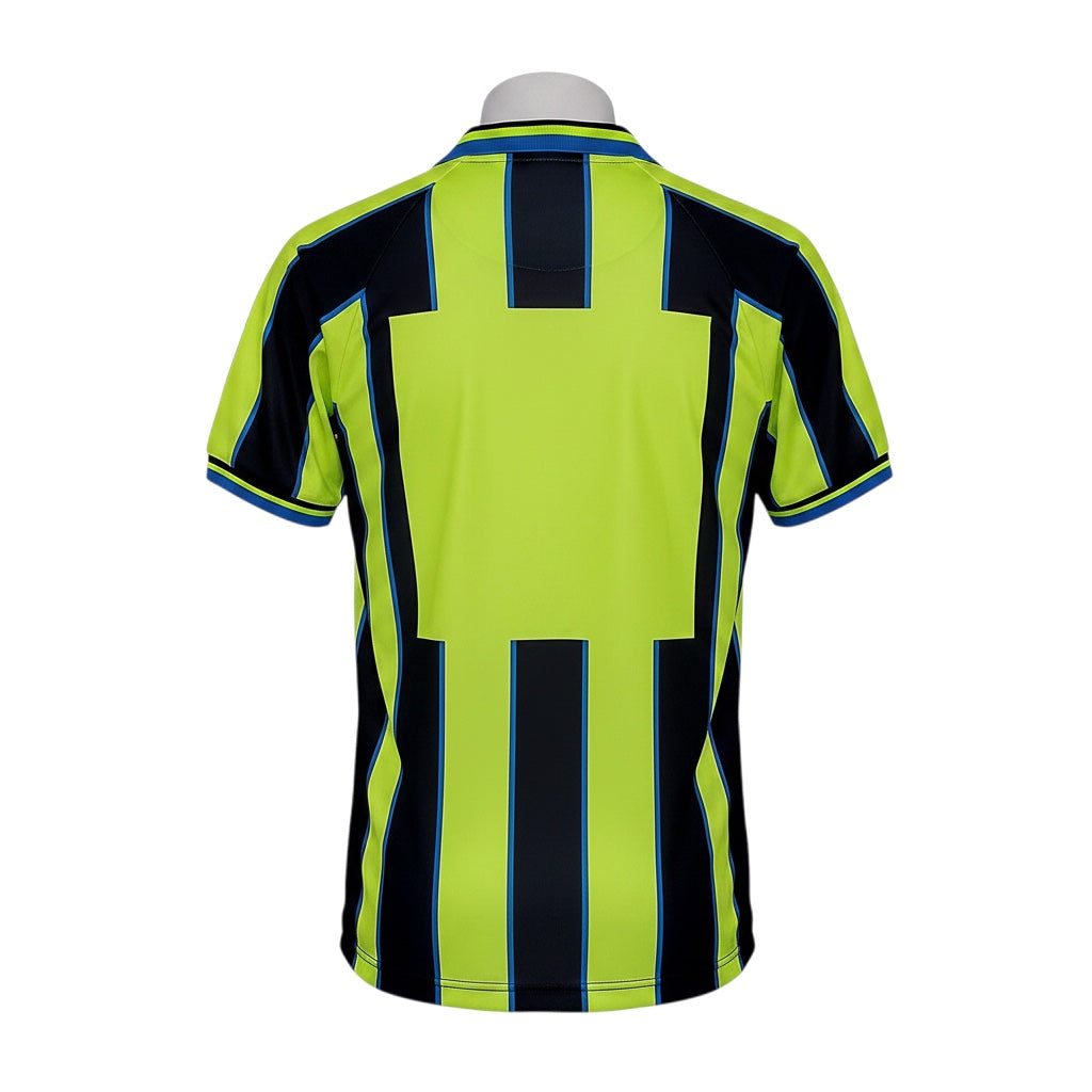 Back view of Archive Football Manchester City 1998/99 retro away jersey in neon yellow, black, and blue stripes.