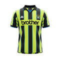 Archive Football Manchester City 1998/99 retro away jersey in neon yellow and black with classic polo collar