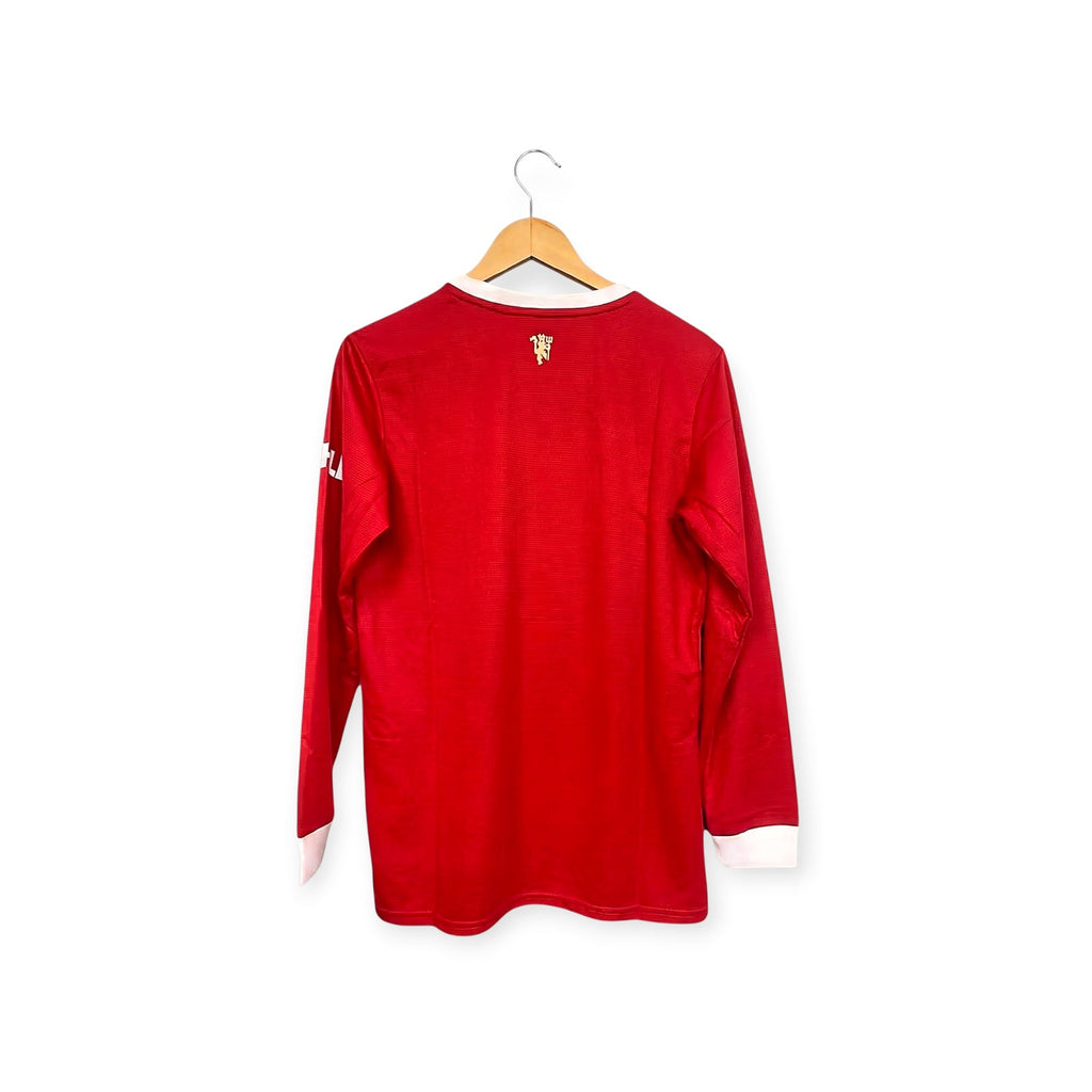 Archive Football Manchester United 2021/22 long sleeve red retro jersey with white cuffs, back view on a hanger