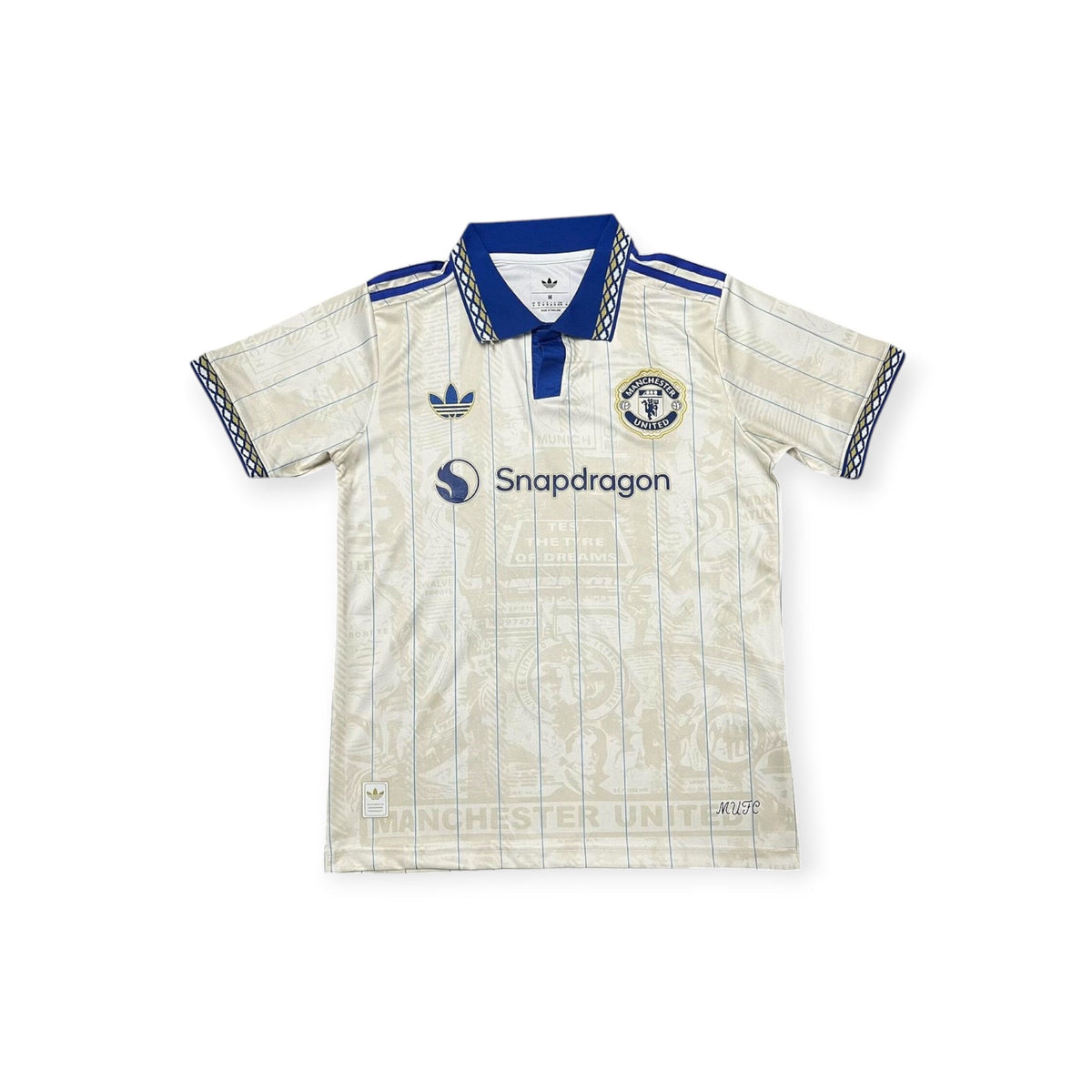 Archive Football Manchester United 2026/2027 special edition jersey in cream with blue collar and pinstripe details.