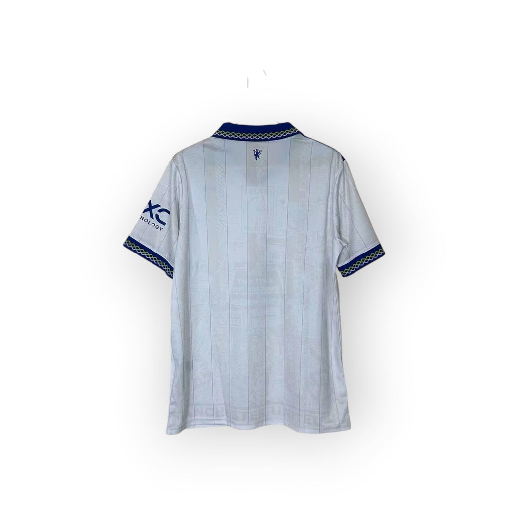 Archive Football Manchester United 2026/27 third jersey back view in white with blue collar and sleeve trim