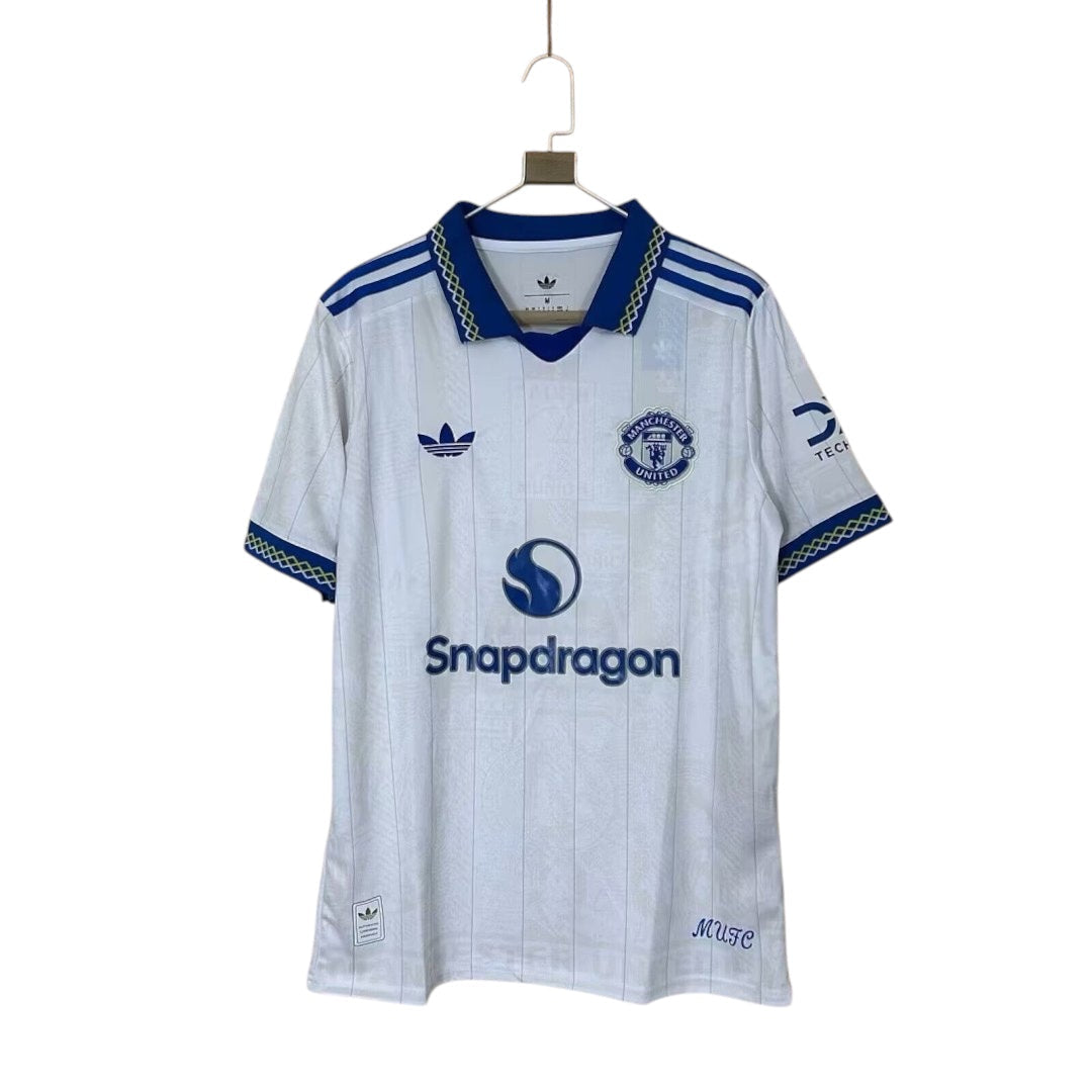 Archive Football Manchester United 2026/27 third jersey in white with blue accents, featuring a patterned collar.