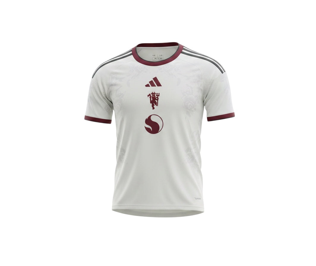 Archive Football Manchester United 2026/2027 third jersey in white with maroon accents and subtle floral pattern.