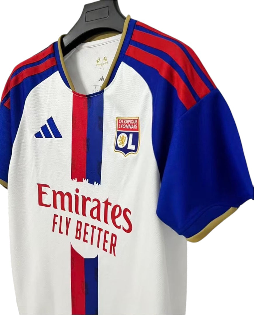 Archive Football Olympique Lyonnais 2026/27 home jersey in white with blue and red details and team emblem