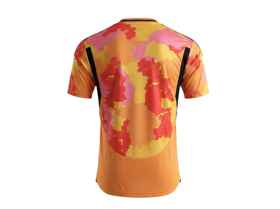 Archive Football Paris FC 2025/26 third jersey featuring a vibrant orange, pink, and red pixelated camouflage pattern.