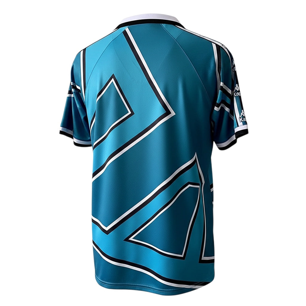 Back view of the Archive Football Real Betis 1995/97 third retro jersey in teal with geometric black and white patterns.