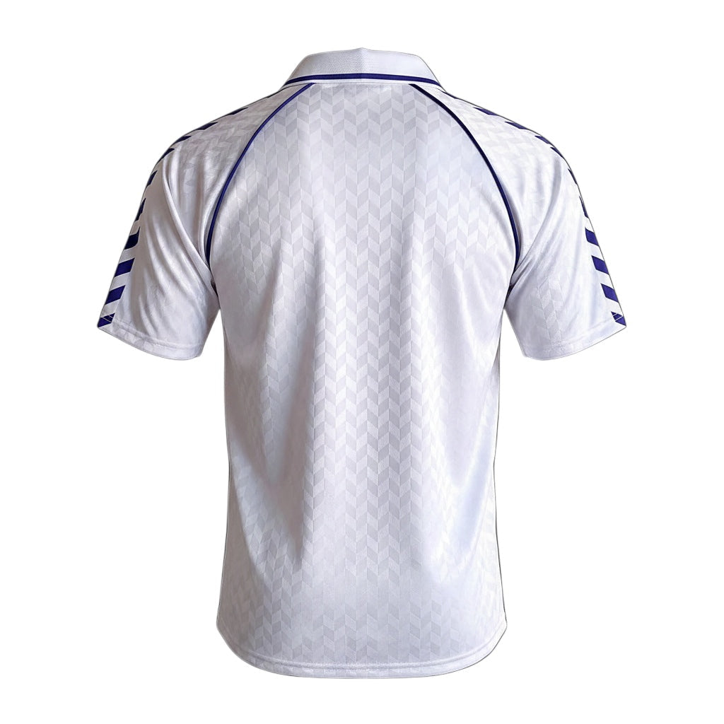 Archive Football Real Madrid 1988/89 retro home jersey, back view of white shirt with purple details and pattern.