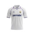 Archive Football Real Madrid 1988/89 retro home jersey in white with purple trim, embroidered crest and sponsor logo.