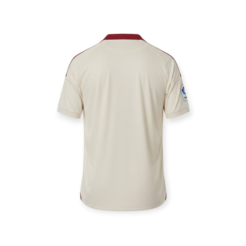 Vista trasera de la camiseta retro Sevilla FC 2026/2027 de Archive Football en color crema con detalles granates