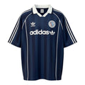 Hinchas Sportswear Store navy blue Adidas Originals retro jersey with white stripes and Trefoil logo.