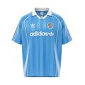 Hinchas Sportswear Store light blue Adidas Originals retro jersey with white stripes and Trefoil logo.