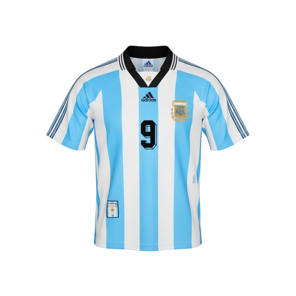 Hinchas Sportswear Store Argentina 1998 retro jersey, white and light blue stripes, black number 9 on front, Adidas logo.