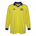 Hinchas Sportswear Store yellow long sleeve Arsenal 1979 FA Cup Final jersey with navy collar and cuffs, featuring Umbro logo and embroidered badge.