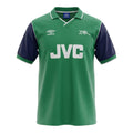 Hinchas Sportswear Store Arsenal 1982 away jersey in green, navy blue, and white with JVC sponsor and cannon crest.