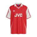Hinchas Sportswear Store red and white 1986 Arsenal retro home jersey with JVC sponsor, Adidas logo, and cannon crest.
