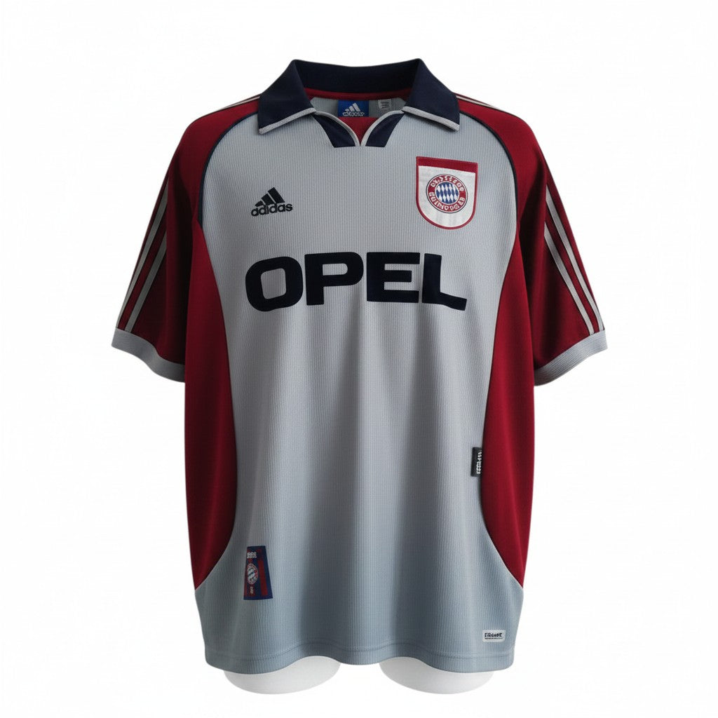 Hinchas Sportswear Store Bayern Munich 1999/00 retro jersey, silver-grey with burgundy raglan sleeves and navy collar. Features Opel sponsor.