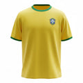 Hinchas Sportswear Store Brazil 1970 retro football jersey in canary yellow with green collar and cuffs, featuring the vintage CBD crest.