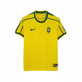 Hinchas Sportswear Store Brazil 1998 World Cup home jersey in yellow with green trim, Nike swoosh, and 4-star CBF crest.