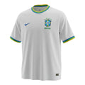 Hinchas Sportswear Store white Brazil 2026 away jersey with palm leaf jacquard, tricolor collar and cuffs, and embroidered crest.