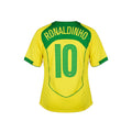 Hinchas Sportswear Store Brazil 2004 Ronaldinho #10 retro football jersey. Yellow with green trim and lettering.