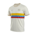 Hinchas Sportswear Store Colombia 100 Years Special Edition Jersey. Off-white, short-sleeve football jersey with yellow, blue, and red stripes across the chest. Features Adidas Originals logo and anniversary crest.