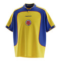 Hinchas Sportswear Store Colombia 2001 yellow & blue Reebok football jersey with blue panels and collar.