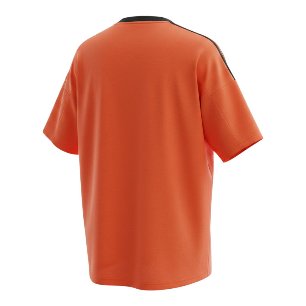 Hinchas Sportswear Store Colombia 2025 training jersey in vibrant orange with black accents, crew neck, and Adidas 3-Stripes on shoulders.