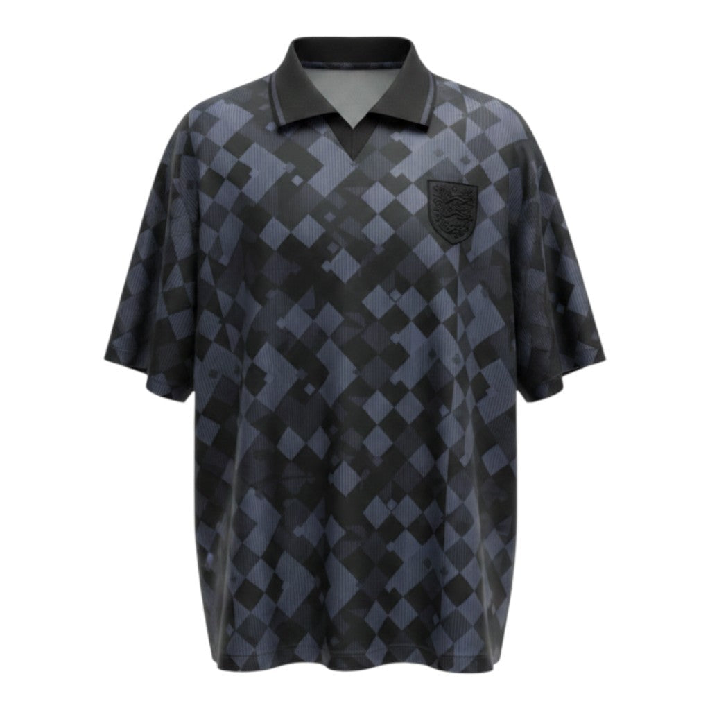 Hinchas Sportswear Store England retro 1990 blackout football jersey with geometric diamond pattern, tonal crest, and black polo collar.