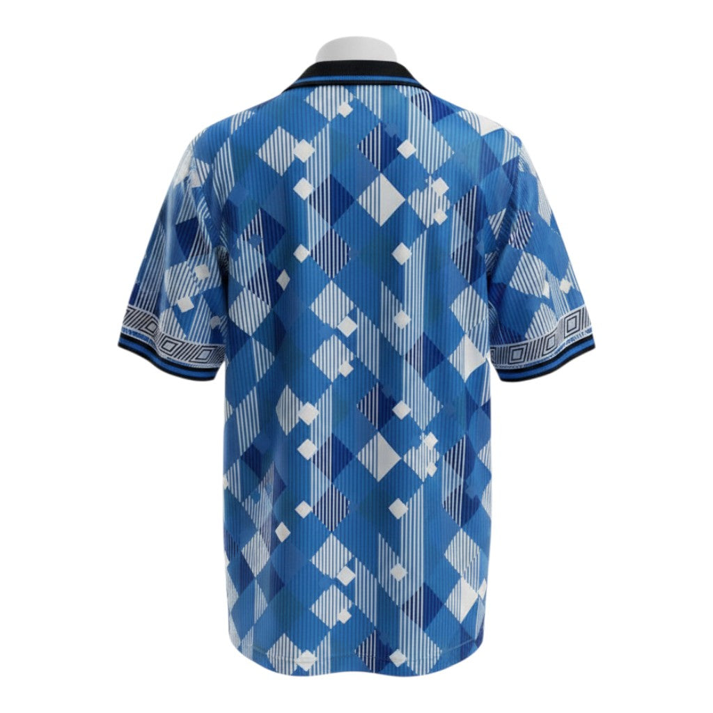 Hinchas Sportswear Store England retro 1990 Italia third jersey in sky blue and royal blue with a geometric jacquard pattern.