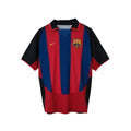 Hinchas Sportswear Store FC Barcelona 2003-04 retro home jersey. Blue and red vertical stripes, black sleeves, Nike swoosh, LFP patch.