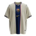 Hinchas Sportswear Store FC Barcelona retro away jersey, sage green with navy and red center panel, gold Nike swoosh, and FCB crest. Striped V-neck collar.