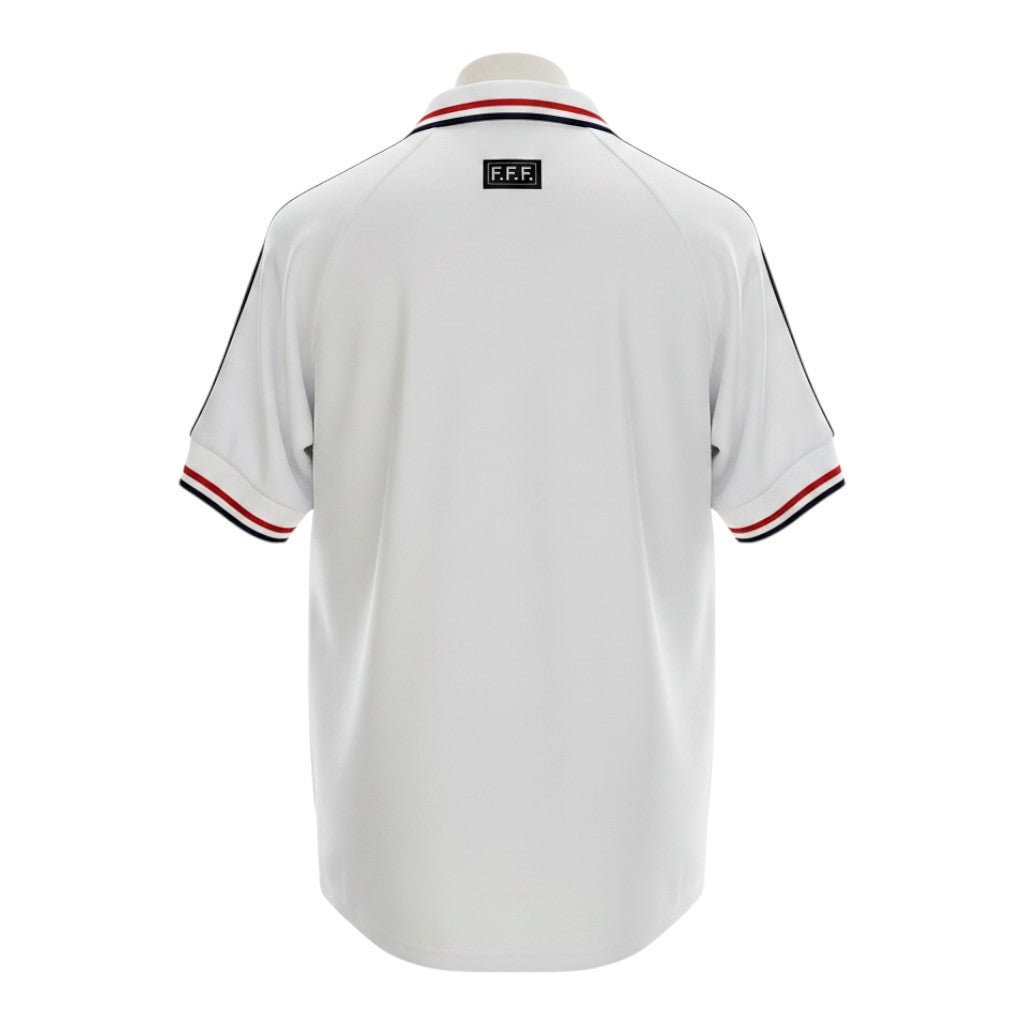 Hinchas Sportswear Store white France 1998 World Cup away jersey with navy, red, and black trim on collar and sleeves. Features F.F.F. logo.