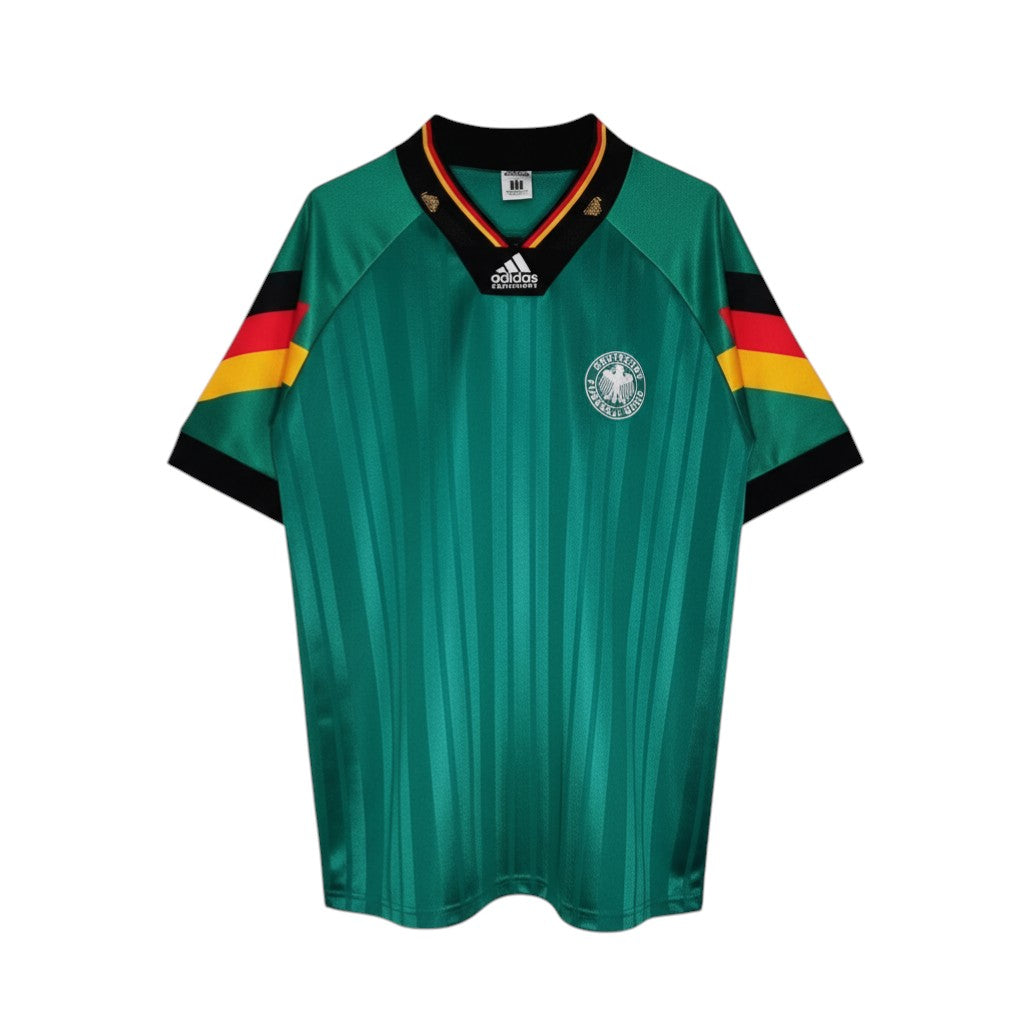 Hinchas Sportswear Store Germany retro 1992 away jersey in emerald green with black, red, and gold trim on collar and sleeves.