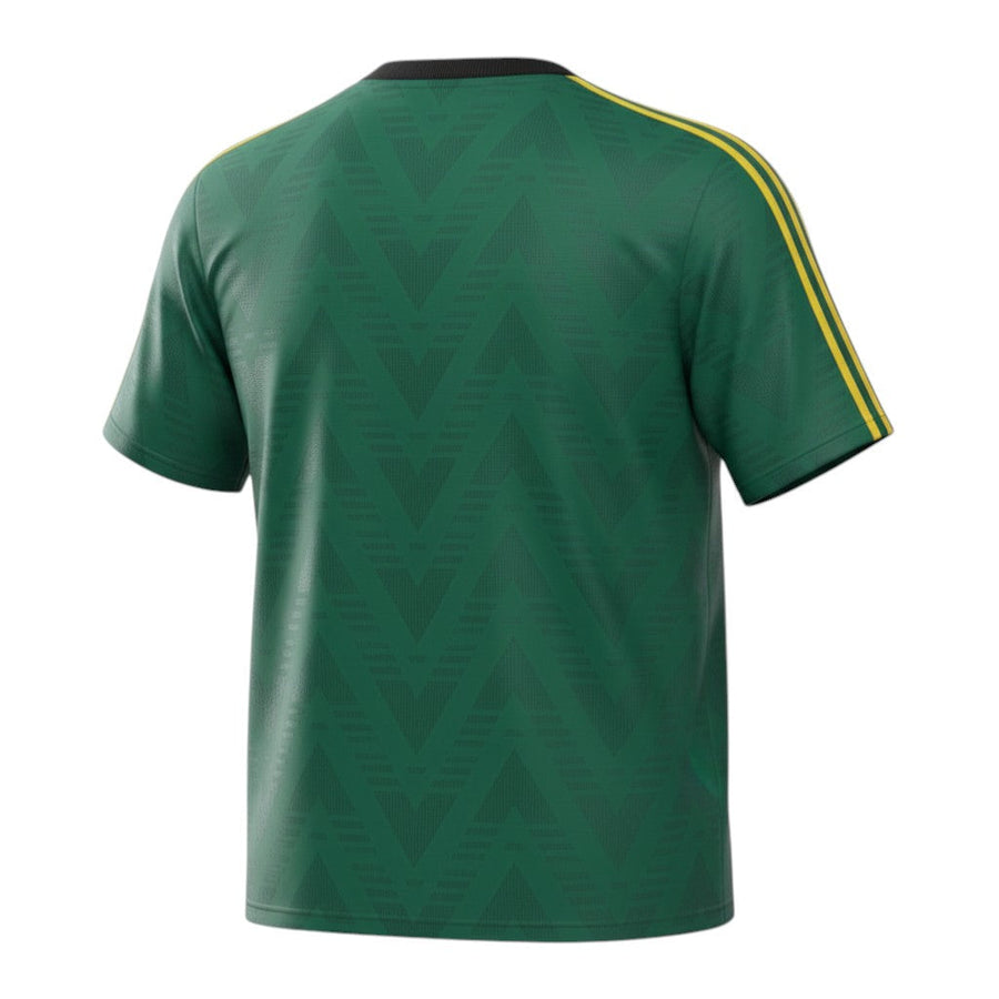 Hinchas Sportswear Store deep green Adidas Originals retro tee with yellow accents, chevron jacquard, and Trefoil logo.
