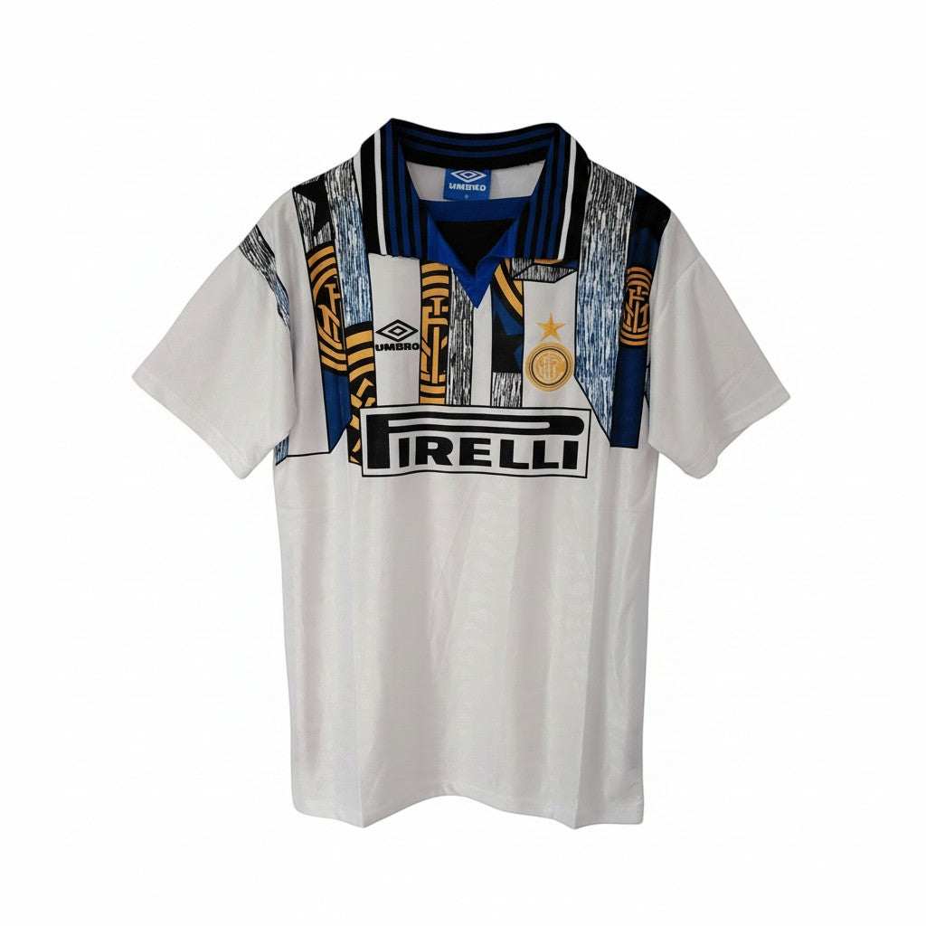 Hinchas Sportswear Store retro white Inter Milan 1994-95 Umbro away jersey with blue and gold graphic chest panel and Pirelli sponsor.