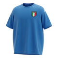 Hinchas Sportswear Store retro Italy 2000 home jersey in azzurro blue with navy side panels, white Kappa Omini tape on shoulders with gold stars, and FIGC crest.